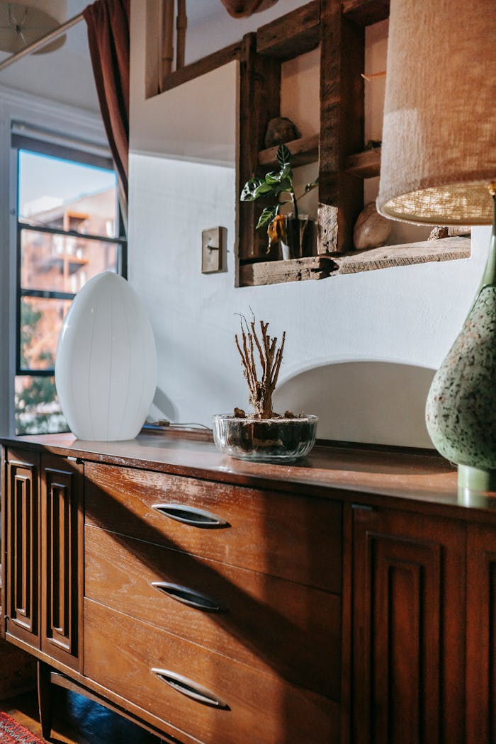 A cozy apartment featuring retro furniture and classic decor with ample natural light.